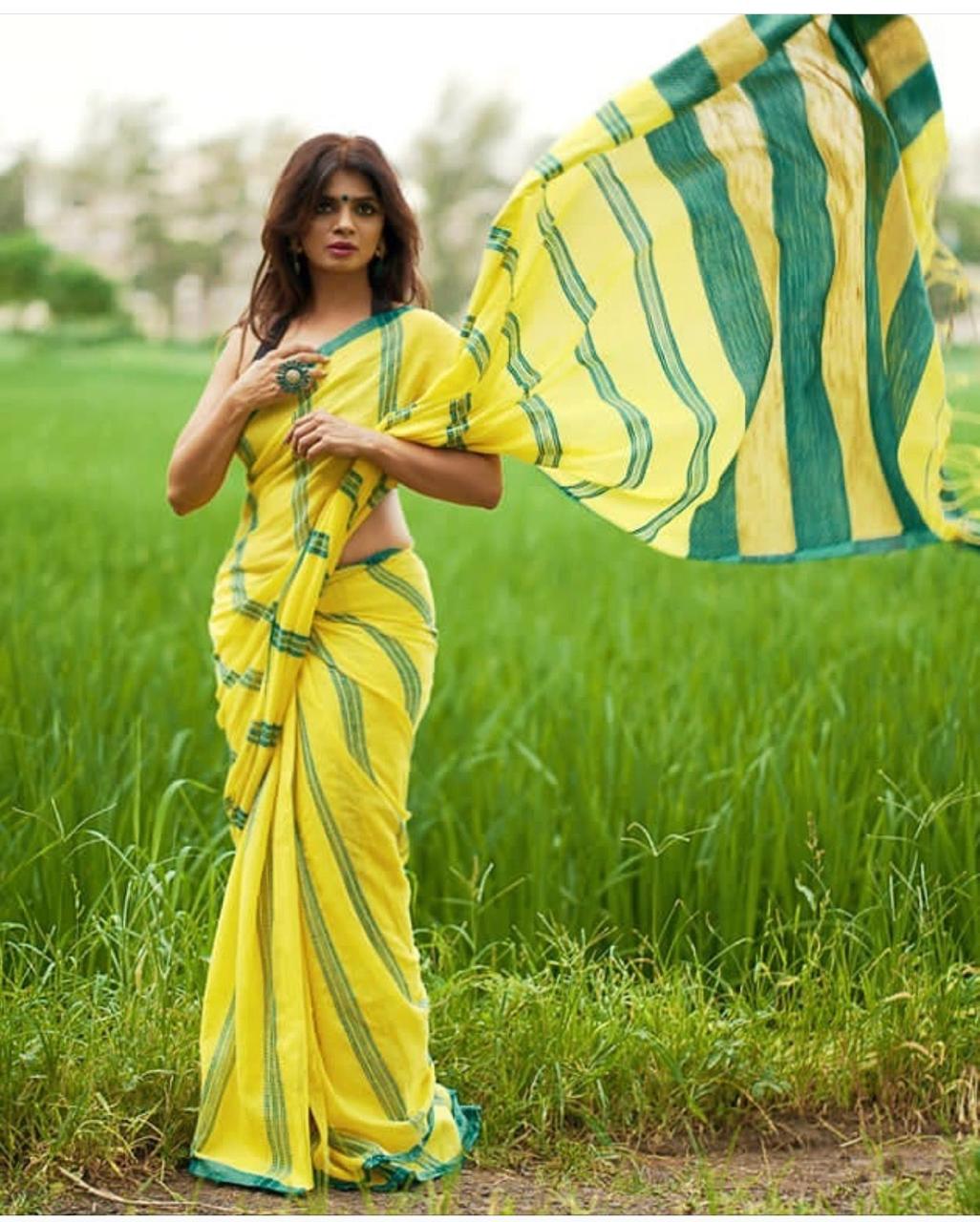 Adorning Yellow color Linen Designer Embroidered Saree